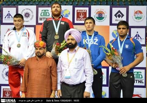 Iranian free style wrestler Parviz Hadi wins the 1st gold medal in Asian Champio