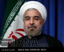 President Rouhani Hails Martyrs Families