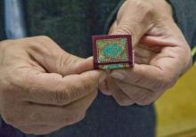 World's smallest Quran copies donated to Astan Quds Razavi library