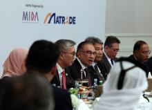 Malaysian Prime Minister Anwar Ibrahim attending a Round Table Meeting with the captain of industries in Qatar Monday.