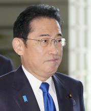 Japanese Prime Minister Fumio Kishida arrives at the premier's office in Tokyo on Dec. 14, 2023, amid a political fundraising scandal that embroiled multiple Cabinet members, including the top government spokesman. (Kyodo)