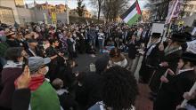 Hundreds of people, including Jews, gather in front of the Israeli Embassy to collectively mourn the US airman Aaron Bushnell, 25, an active-duty member of the US Air Force, who died after setting himself ablaze in protest of Israel's ongoing war in Gaza on February 26, 2024, in Washington, DC. ( Celal Gunes - Anadolu Agency )