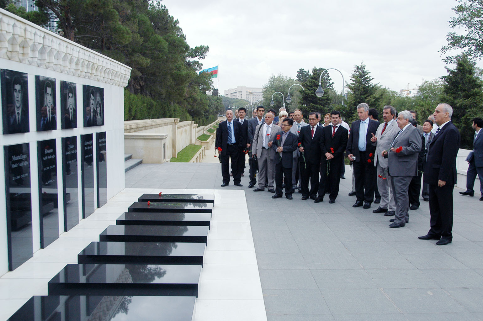 Participants of the 30th OANA Executive Board meeting visit the Alley of Martyrs
