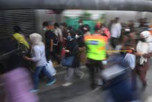Several people walks in Tanah Abang Train Station, Jakarta, Monday (Feb 7, 2022). ANTARA FOTO/Akbar Nugroho Gumay/rwa.