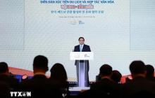 Prime Minister Pham Minh Chinh speaks at the forum. (Photo: VNA)