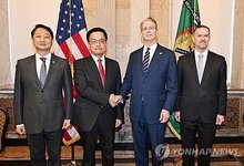 South Korea's Finance Minister Choi Sang-mok (2nd from L), Trade Minister Ahn Duk-geun (L), U.S. Treasury Secretary Scott Bessent (2nd from R) and U.S. Trade Representative (USTR) Jamieson Greer pose for a photo prior to trade talks in Washington on April 24, 2025, in this photo provided by Seoul's industry ministry. (PHOTO NOT FOR SALE) (Yonhap)