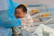 This file photo taken July 24, 2025, shows a newborn baby at a hospital in Goyang, just west of Seoul. (Yonhap)