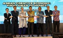 Deputy Minister of Tourism, Arts and Culture of Malaysia, Khairul Firdaus Akbar Khan (centre) poses for a group photo with VIPs after delivering the opening speech of the ASEAN-UK Symposium on Developing a Sustainable Framework for ASEAN Creative Economy: From Ideas to Impact at the Park Royale Collection on Thursday..