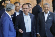 Malaysia's PM Anwar Ibrahim (centre)