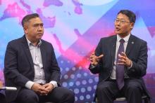 Minister Counsellor of People's Republic of China Lin Shiguang speaking about Malaysia and China Friendship at an interview co-hosted by BernamaTV and China Global TV Network (CGTN) during a visit by CGTN team to Bernama TV at Wisma Bernama recently, with Malaysia Transport Minister Anthony Loke (left).  -- photoBERNAMA