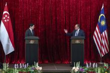 PUTRAJAYA, June 12 -- Malaysia's Prime Minister Anwar Ibrahim (right) with his counterpart from Singapore Lawrence Wong hold a joint media conference in conjunction with visiting Singapore prime minister’s two-day working visit to Malaysia.  --fotoBERNAMA (2024) COPYRIGHT RESERVED