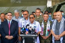 Malaysia’s Defence Minister Mohamed Khaled Nordin (middle) at a press conference after visiting the 127 Palestinians who arrived in two Royal Malaysian Air Force (RMAF) Airbus A-400M aircraft at the Subang Air Base here Friday. 