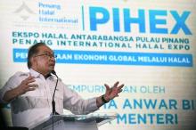 Prime Minister Datuk Seri Anwar Ibrahim deliver his speech during an opening of the Penang International Halal Expo (PIHEX) 2024 held at the Gravitas parking lot Saturday.