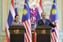 Malaysian Prime Minister  Anwar Ibrahim (right) and  Thailand's Prime Minister Paetongtarn Shinawatra - fotoBERNAMA