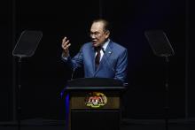 Prime Minister Anwar Ibrahim delivers a speech at the public lecture by President of Turkiye Recep Tayyip Erdogan at the Putrajaya International Convention Centre (PICC) Monday.