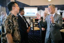  Investment, Trade and Industry Minister Tengku Zafrul Abdul Aziz (right) sharing a light moment with guests at a luncheon hosted by the Investment, Trade and Industry Ministry in conjunction with the 54th Organization of Asia-Pacific News Agencies (OANA) Executive Board Meeting on Monday.