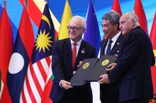 KUALA LUMPUR, July 9 -- Malaysian Foreign Minister, Datuk Seri Mohamad Hasan receives a document from Algeria’s Minister of State and Minister of Foreign Affairs, National Community Abroad and African Affairs, Ahmed Attaf (right) and Uruguay’s Minister of Foreign Affairs, Mario Lubetkin (left) following the signing ceremony of the Instrument of Accession to the Treaty of Amity and Cooperation in Southeast Asia (TAC) at the 58th ASEAN Foreign Ministers’ Meeting (AMM) and related meetings at the Kuala Lumpur 