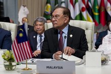 Prime Minister Anwar Ibrahim attends The Extraordinary Arab-Islamic Summit held in the Qatari capital on Monday.