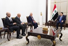 PM, Mohammed Shia al-Sudani (right), delegation from KPMG, a global auditing and financial consulting firm (left)