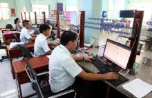 The civil service workforce will be cut by at least 20%. (Photo: VNA)