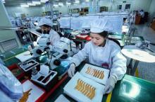 Workers at an FDI firm in Yen Phong Industrial Park, Bac Ninh province. (Photo: VNA)