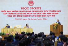 PM Pham Minh Chinh speaks at the conference held on March 14 to launch monetary policy-related tasks for this year. (Photo: VNA)