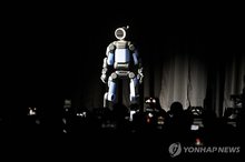 A robot developed by Boston Dynamics, the U.S. robotics unit of Hyundai Motor Group, appears on stage at a presentation hosted by the group at CES 2026 in Las Vegas on Jan. 5, 2025. (Pool photo) (Yonhap)