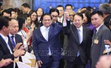 Prime Minister Pham Minh Chinh (left) and ADB President Masatsugu Asakawa at the celebration. (Photo: VNA)