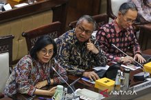 Finance Minister Sri Mulyani, BI Governor Perry Warjiyo, Chairman of the OJK Board of Commissioners Mahendra Siregar