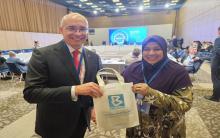 TASS director general Andrey Kondrashov with Bernama's Chief Executive Officer Nur-ul Afida Kamaludin