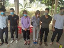 Some of the people who were attempting to leave the country illegally on February 24 (Photo: VNA)