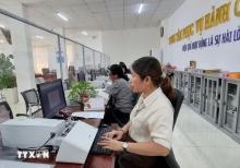 Civil servants at a public administrative service centre. (Photo: VNA)