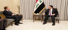 First Deputy Speaker of the Iraqi Council of Representatives, Mohsen Al-Mandalawi (right), the French Ambassador to Iraq, Patrick Durel (left)