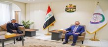 Deputy Prime Minister, Minister of Planning, Mohammed Tamim (right) the Special Representative of the UN Secretary-General for Iraq, Mohammed Al-Hassan (left)