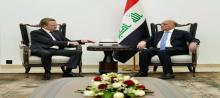 Deputy PM, Minister of Foreign Affairs Fuad Hussein (right), French Ambassador Patrick Durel (left)