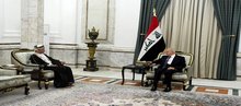 President Abdul Latif Jamal Rashid (right), the UN Secretary-General’s representative in Iraq, Mohammed Al-Hassan (left)