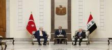 Iraqi President Abdul Latif Jamal Rashid (right), his Turkish counterpart, Recep Tayyip Erdogan (left)