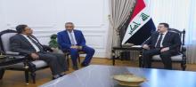 PM, Mohammed Shia al-Sudani (right), Indian Ambassador Somen Bagchi (left)