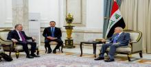 President Abdul Latif Jamal Rashid (right), Turkish Deputy FM Nuh Yilmaz (left)