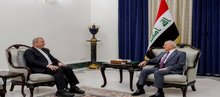 President Abdul Latif Jamal Rashid (right), the Ambassador of the Islamic Republic of Iran to Iraq, Mohammad Kazem Al-Sadiq (left) 