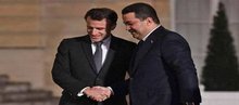 Iraqi PM Mohammed Shia al-Sudani (right), French President, Emmanuel Macron (left)