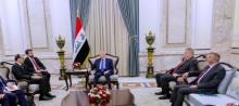 Iraqi President Abdul Latif Jamal Rashid receives the head of the Turkish Intelligence Service