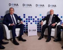 FM, Fuad Hussein (right), his Russian counterpart Sergey Lavrov ( left) in Duha