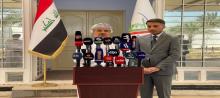 Najaf Governor Yousef Kanawi (right), Omani Minister of Transport Saeed bin Hamoud Al-Maawali (left)