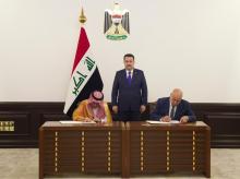 PM, Mohammed Shia Al-Sudani (centre), minister of Culture (right), head of the Arab Tourism Organization affiliated with the League of Arab States, Bandar bin Fahd Al-Fahid (left)