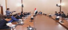 PM Mohammed al-Sudani (center) meets with a delegation from J.P. Morgan, headed by the bank's Deputy Director, Daniel Zeljko