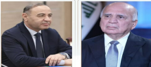 FM, Fuad Hussein (right), the acting FM and International Cooperation of Libya, Taher Al-Baour (left)