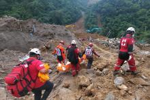 Disaster response workers and volunteers have shifted from search and rescue to retrieval operations at the landslide area in Barangay Masara, Maco, Davao de Oro on Feb. 14, 2024, seven days after the landslide incident. 