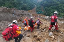 Disaster response workers and volunteers have shifted from search and rescue to retrieval operations at the landslide area in Barangay Masara, Maco, Davao de Oro on Feb. 14, 2024, seven days after the landslide incident.