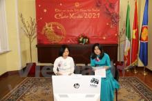 Vietnamese Ambassador to Italy Nguyen Thi Bich Hue (left) speaks at a virtual gathering for adopted Vietnamese children in Italy on March 7. (Photo: VNA)